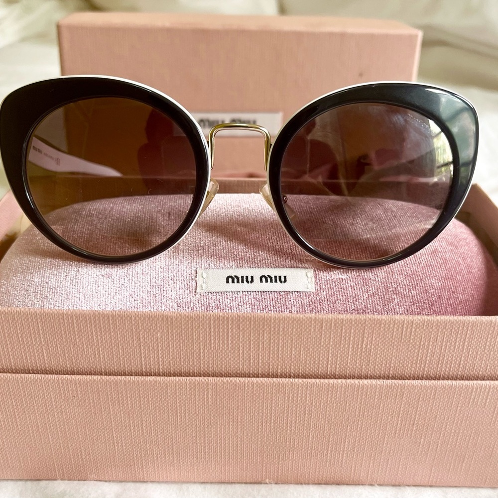 Chic Miu Miu sunglasses.